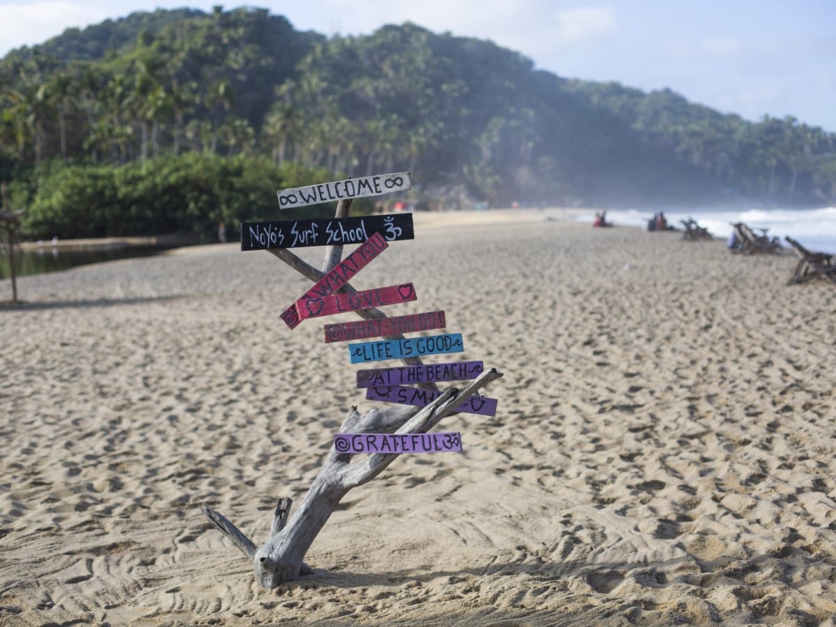 Surf shop ads on the main beach in Sayulita