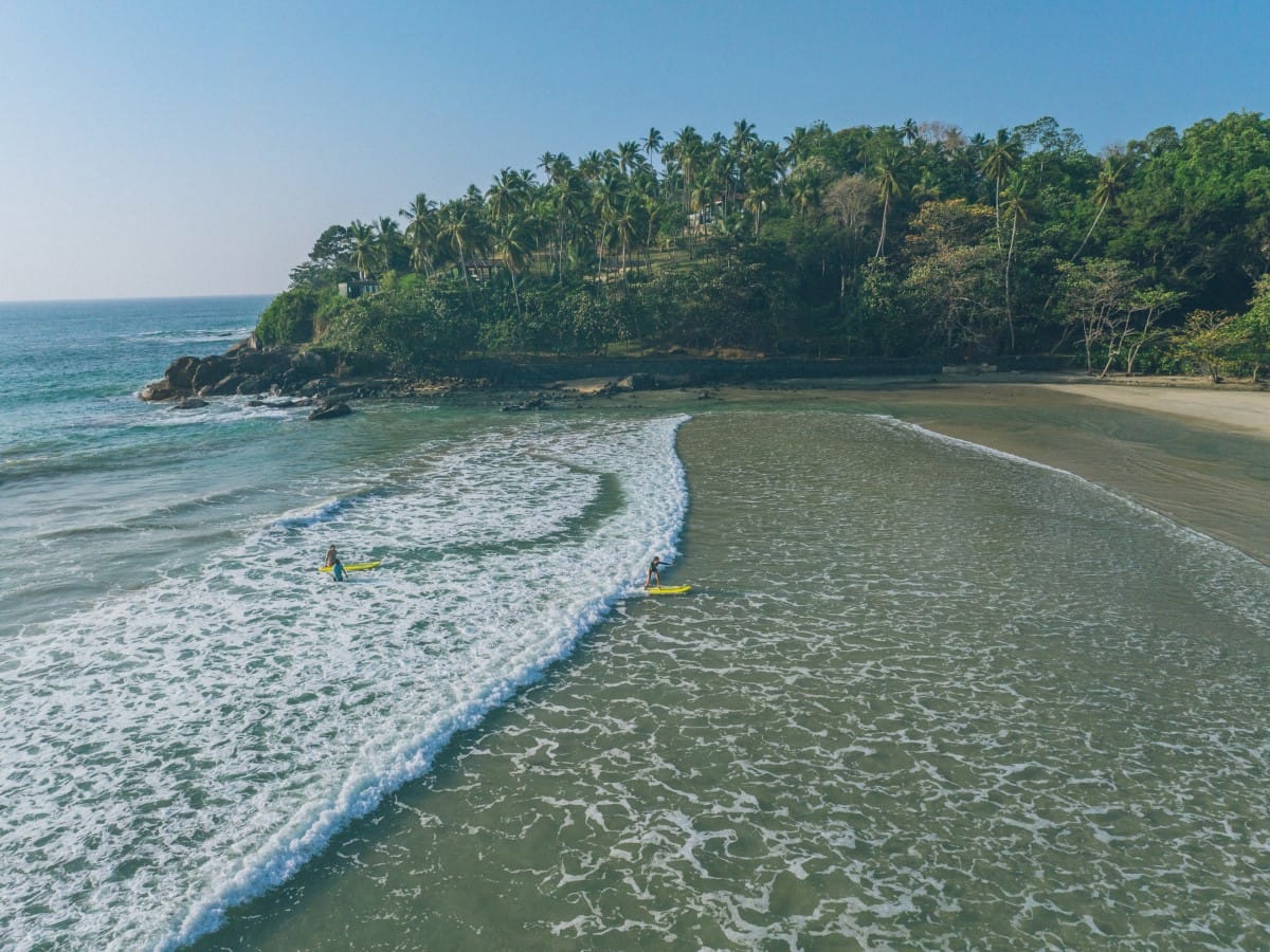 White lighthouse Dondra Head and tropical palms, Sri Lanka, near Matara.