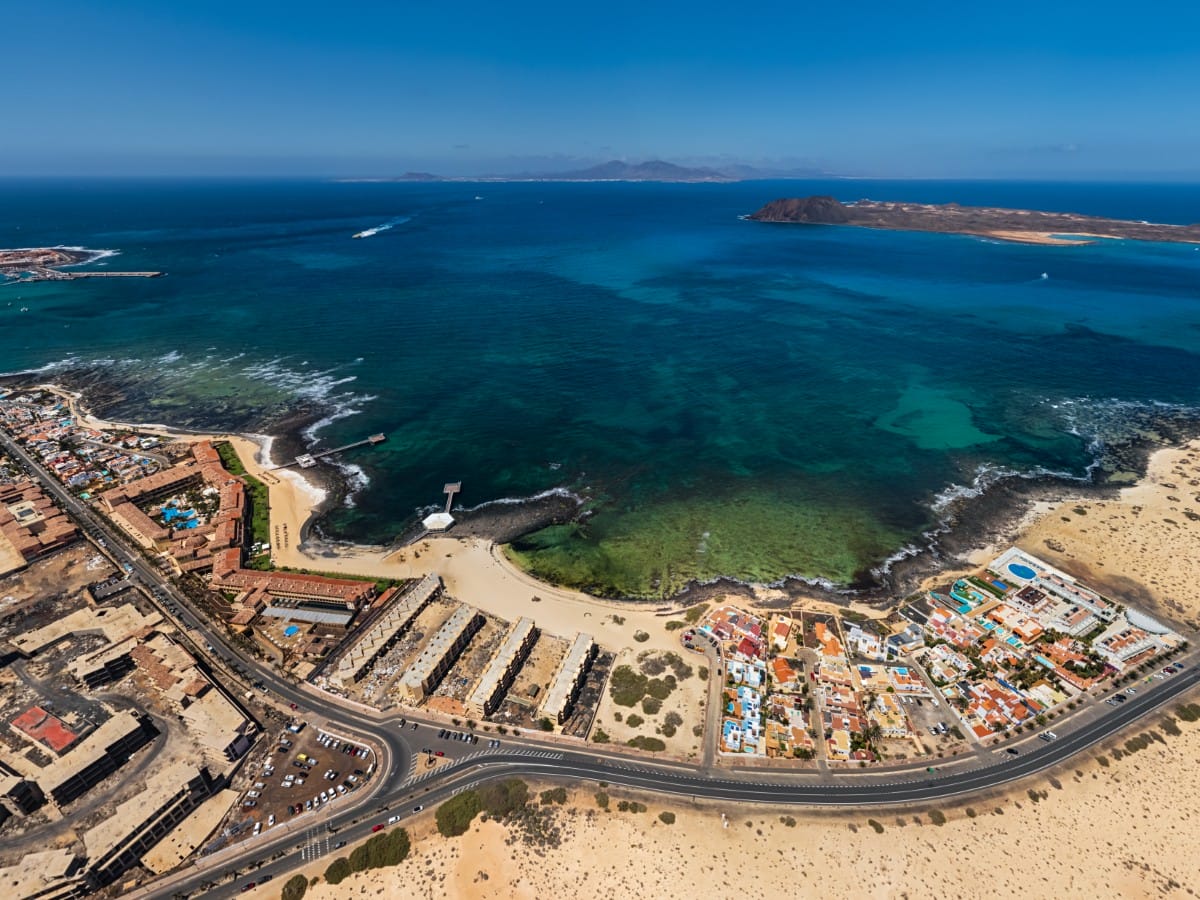 The rocky reefs that line the beaches of Corralejo town