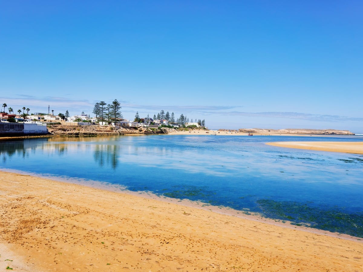 Buildings line the river in Oualidia