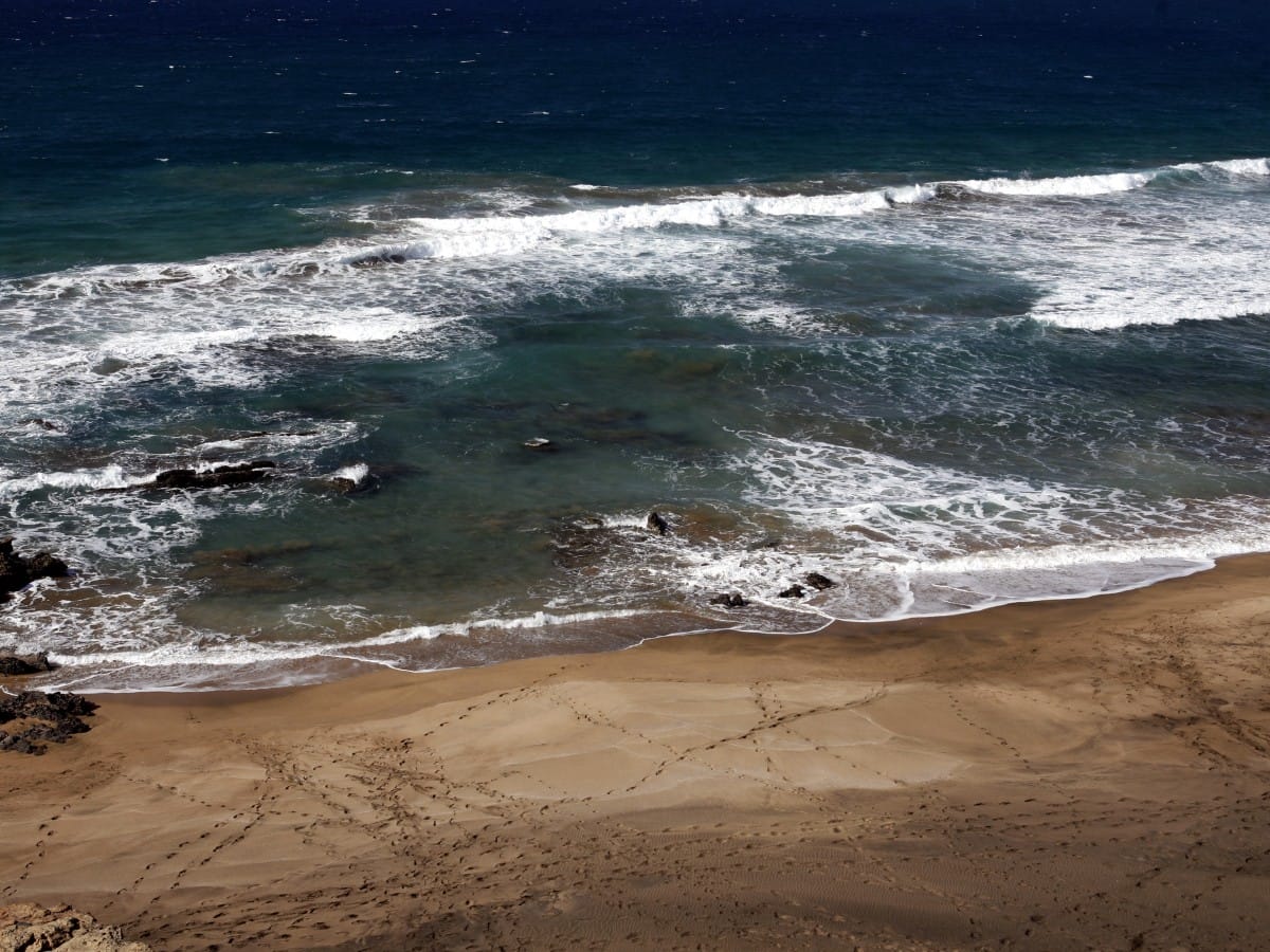 Whitewater breaking on the reefs along Playa de Garcey